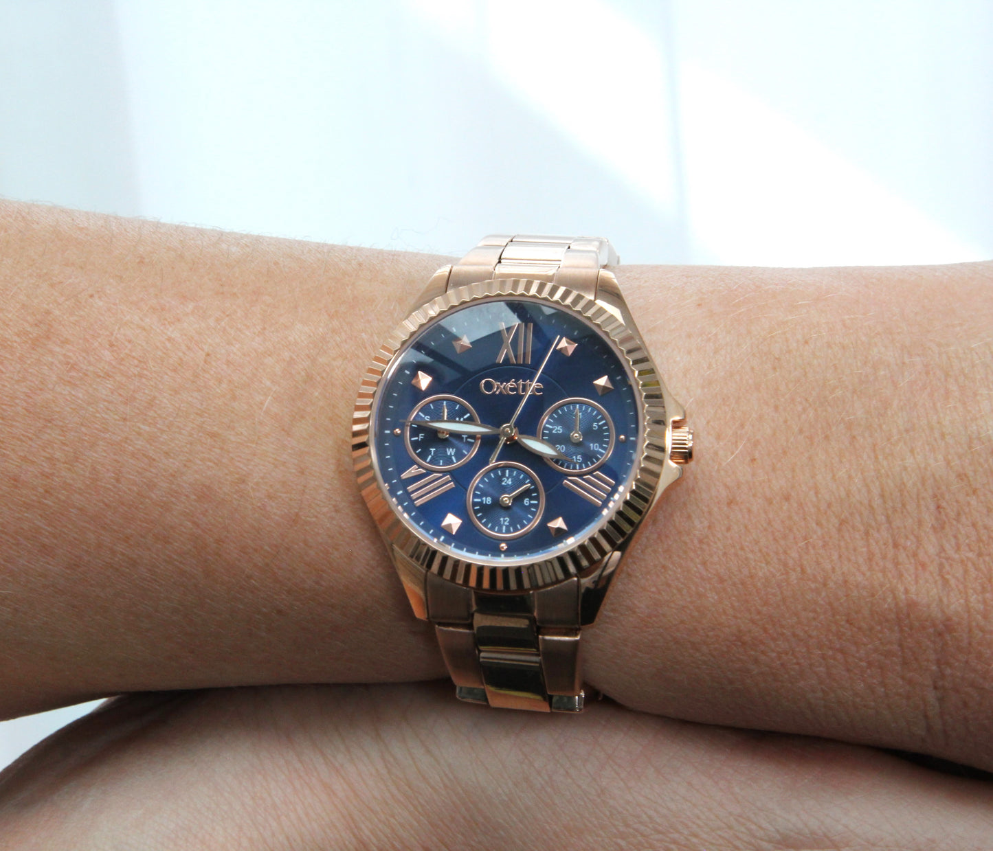 Landmark watch with rose gold steel bracelet and blue dial